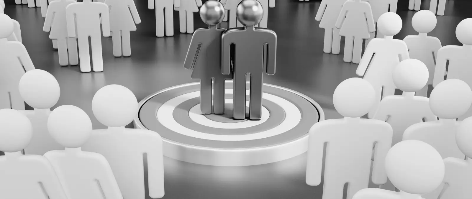 Metallic male and female figures stand together on a target, surrounded by white, featureless human figures in a circle. The scene appears to be in black and white, reminiscent of the precision and focus described in A guide to keywords in SEO.