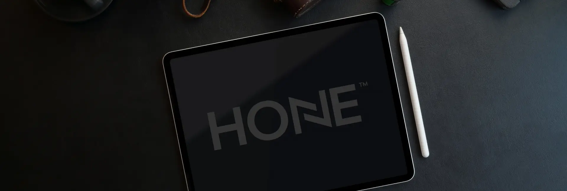 Hone Digital logo displayed on a tablet