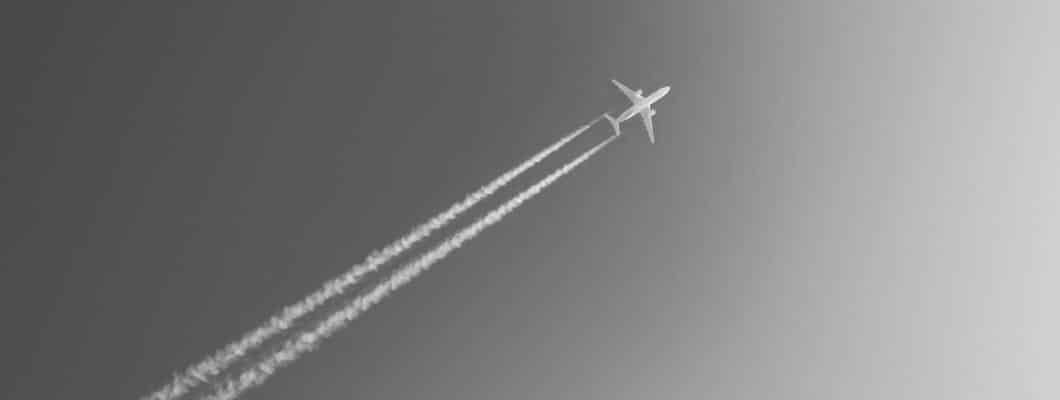 plane flying across the sky