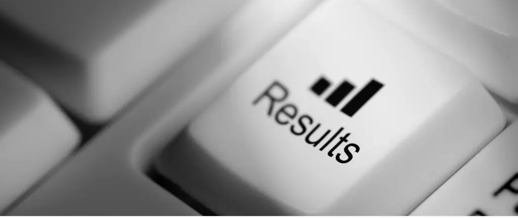 Close-up of a white keyboard key labelled Results with a bar chart icon above the text, suggesting a focus on outcomes or data.
